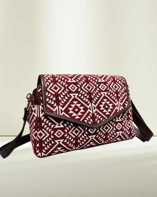 jacquard compact sling bag by surovi