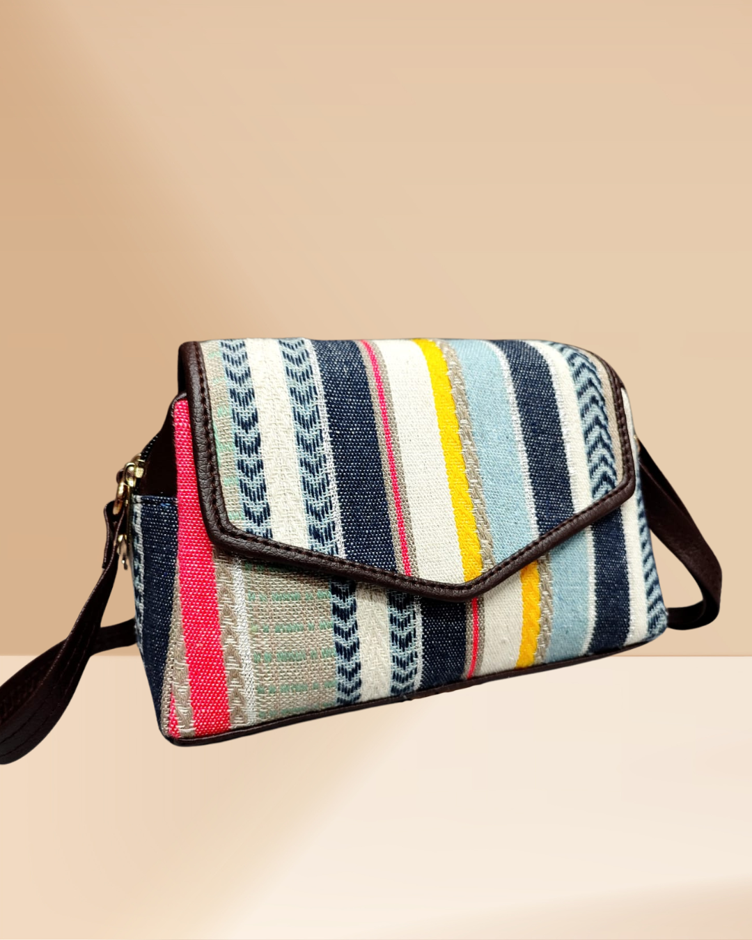 jacquard compact sling bag by surovi