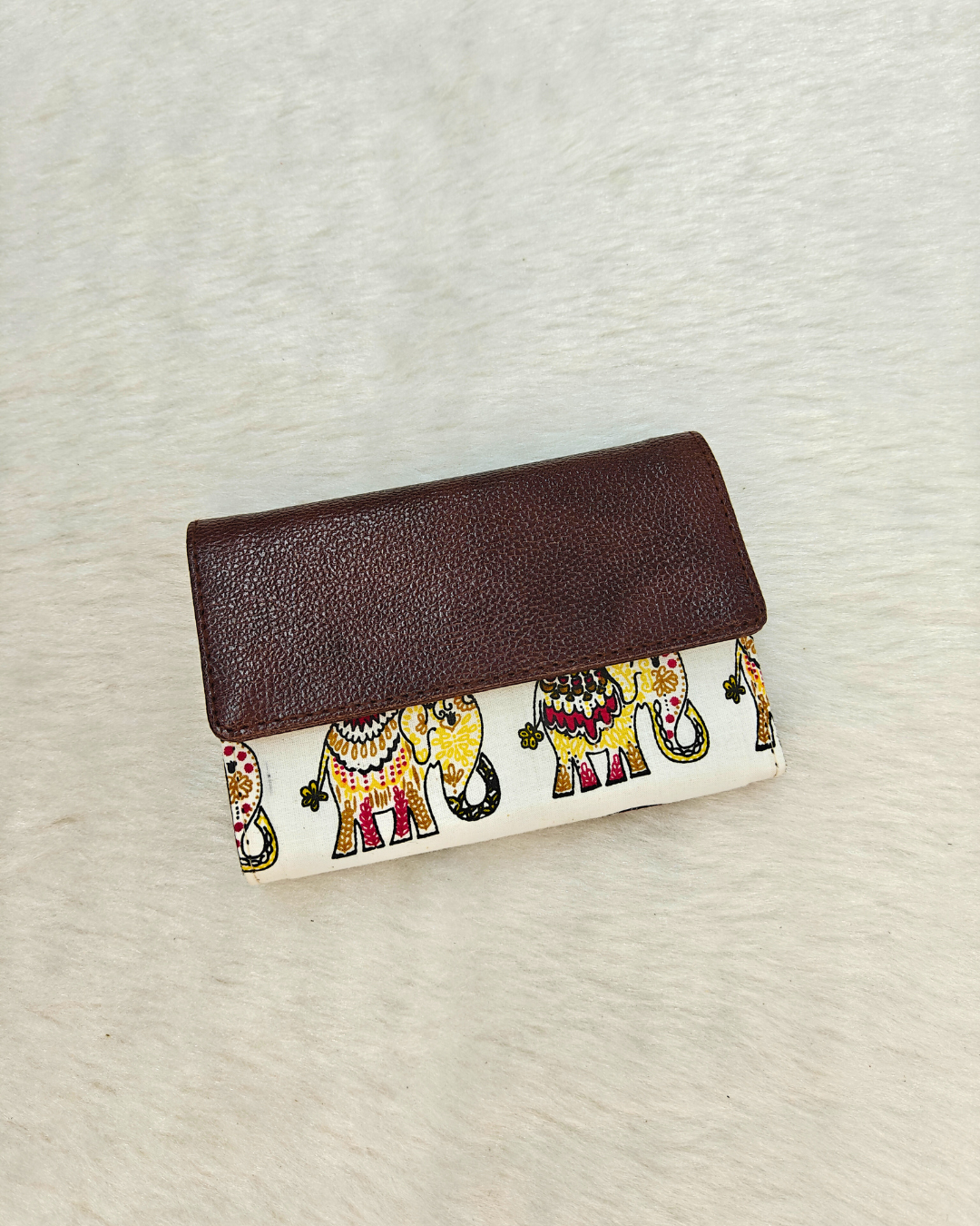Ikat Elegance: Stylish 3-Fold Wallet in Vibrant Fabric - White Elephant